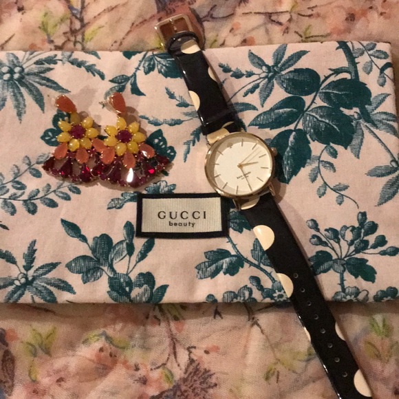 Kate Spade watch and Kate Spade earrings.